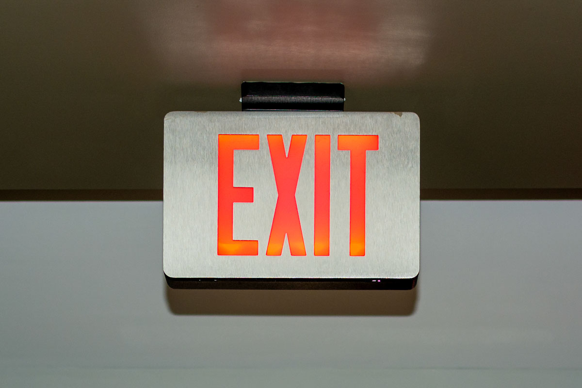 Silver & Orange exit sign
