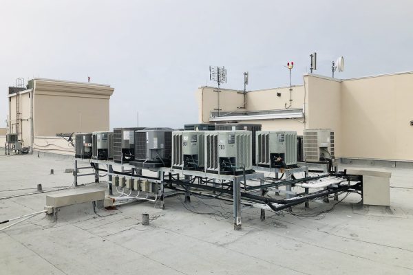 Air conditioning units on roof of a high rise condo building